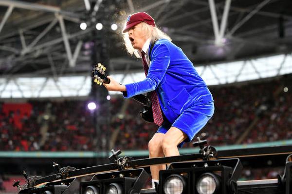 LONDON, ENGLAND - JULY 03: Angus Young of AC/DC performs during the PWR UP Tour at Wembley Stadium on July 03, 2024 in London, England.  (Photo by Jim Dyson/Getty Images)